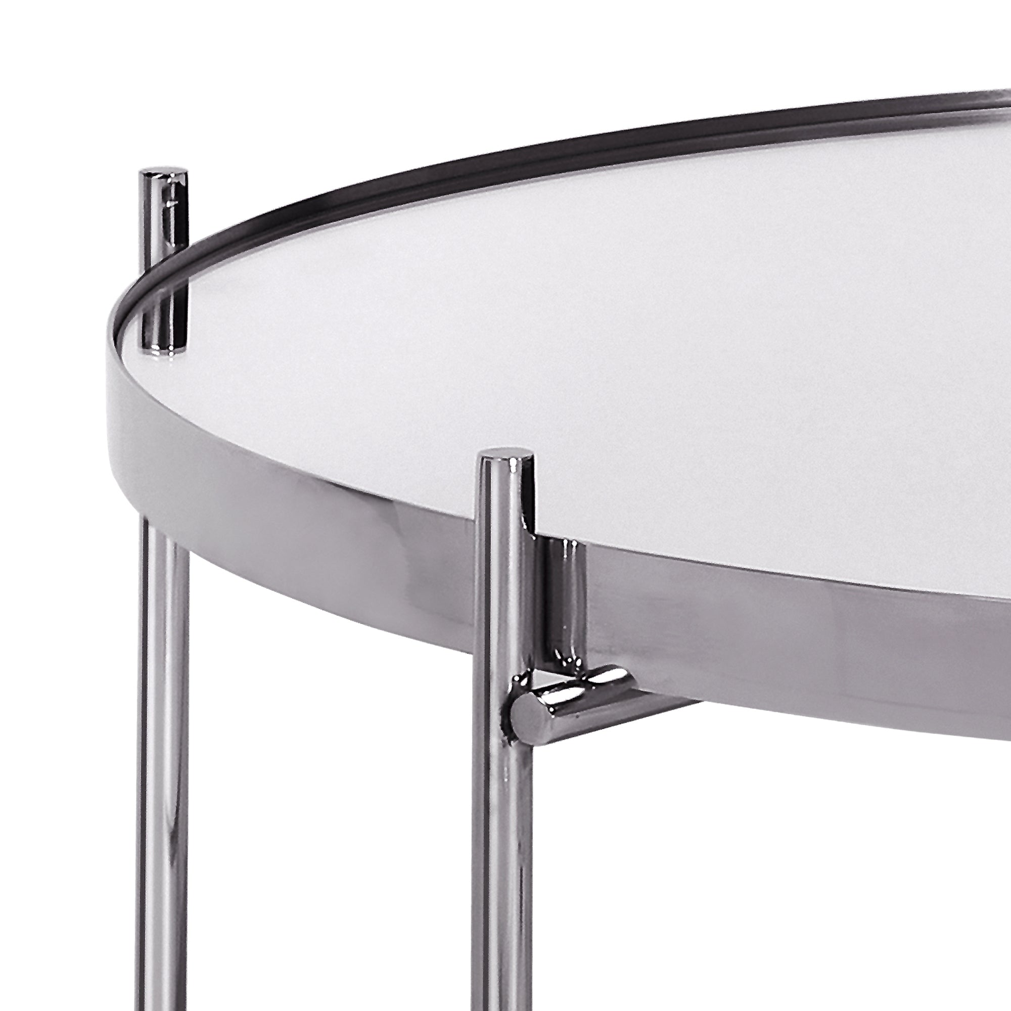 Round table with a silver metal surface and three legs.