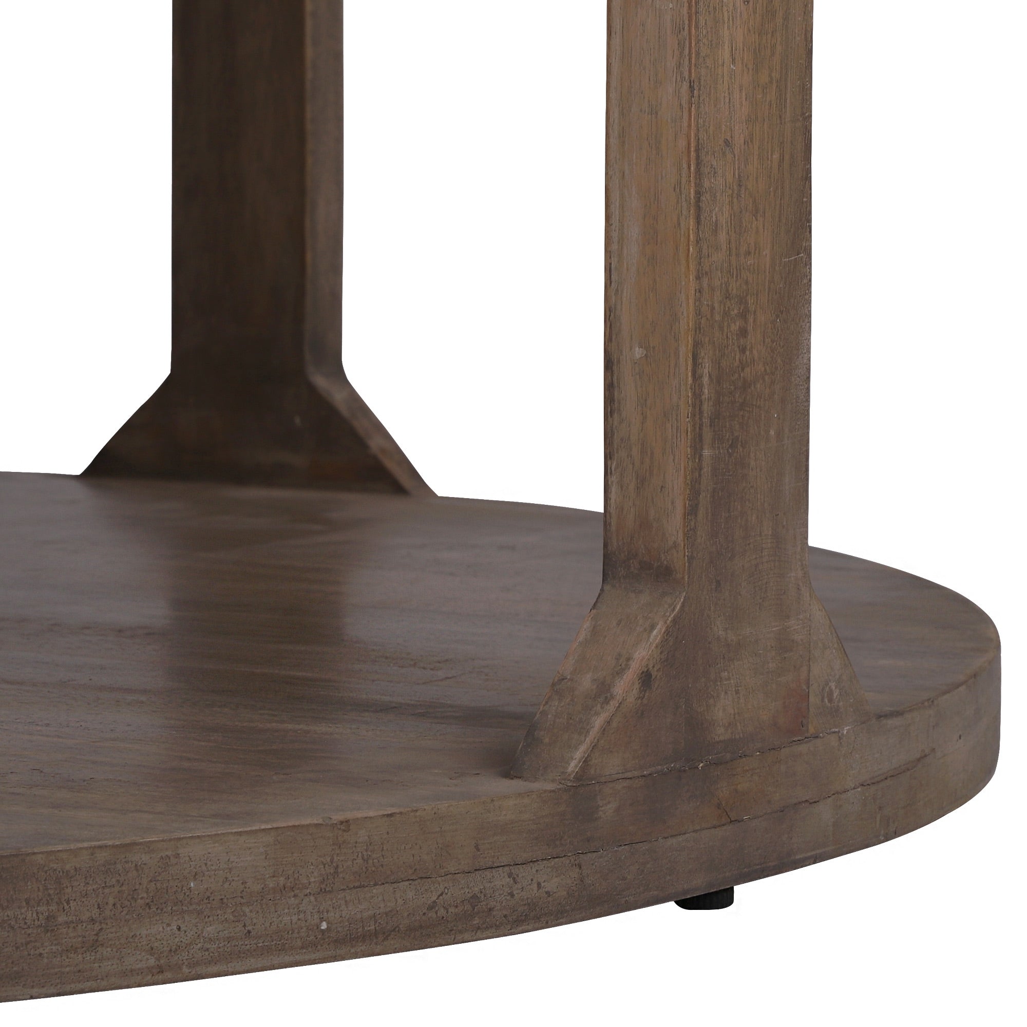 Detailaufnahme eines Tischbeins aus Holz, rundes Fußteil.