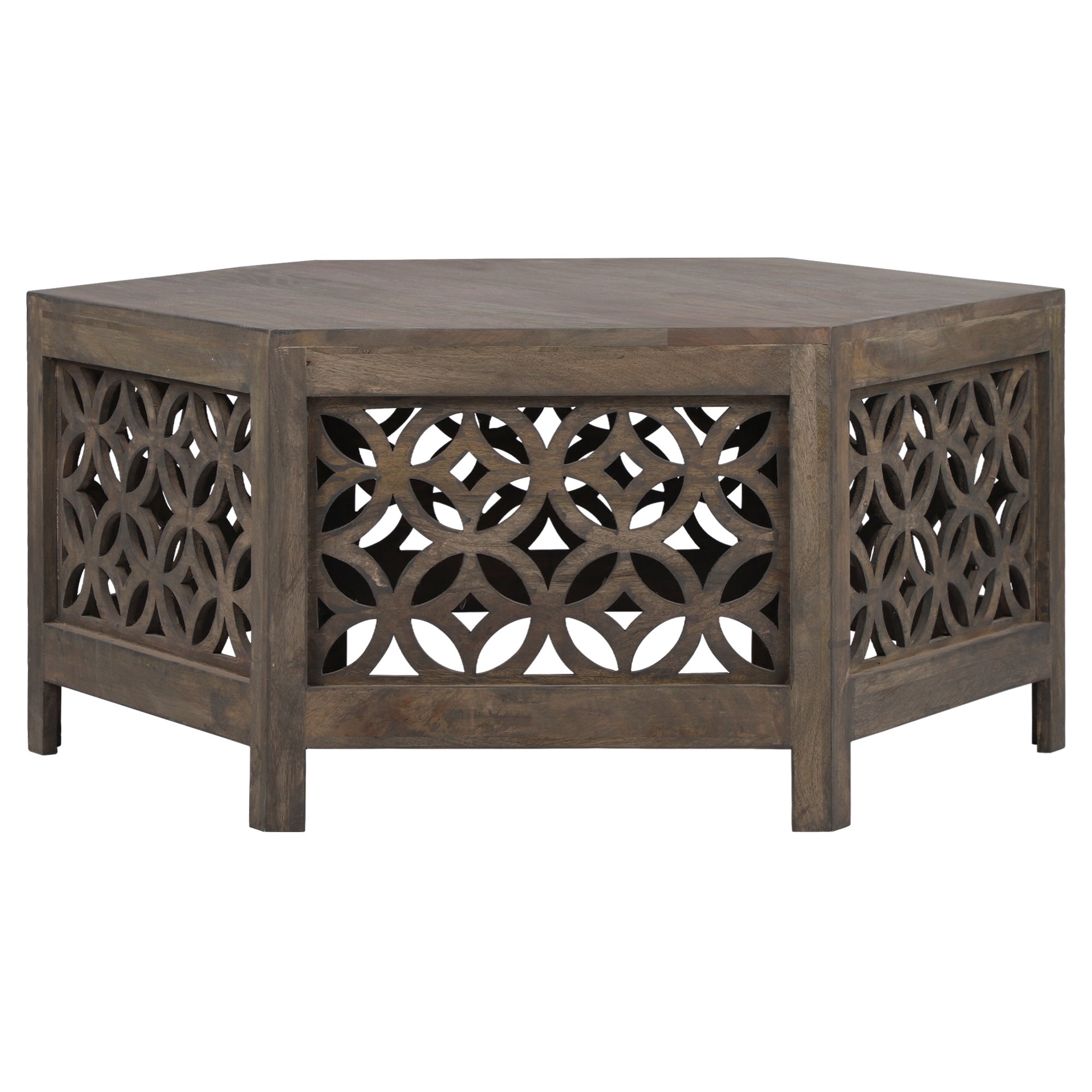 Sechseckiger Couchtisch mit dekorativem, durchbrochenem Holzdesign.