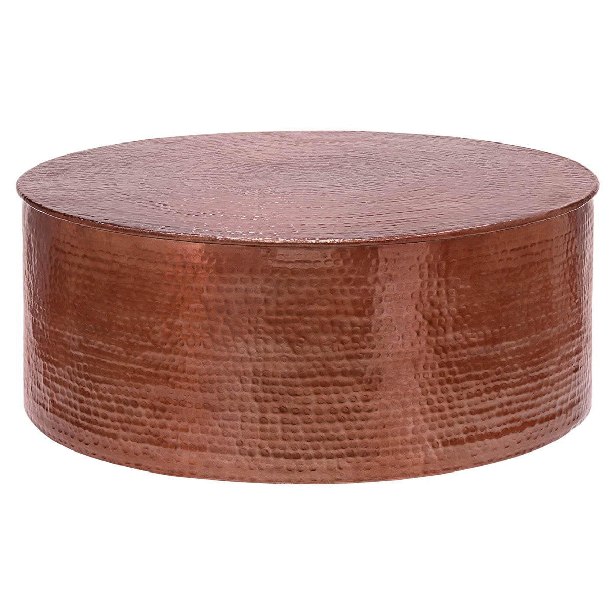 Round copper coffee table with a hammered surface.