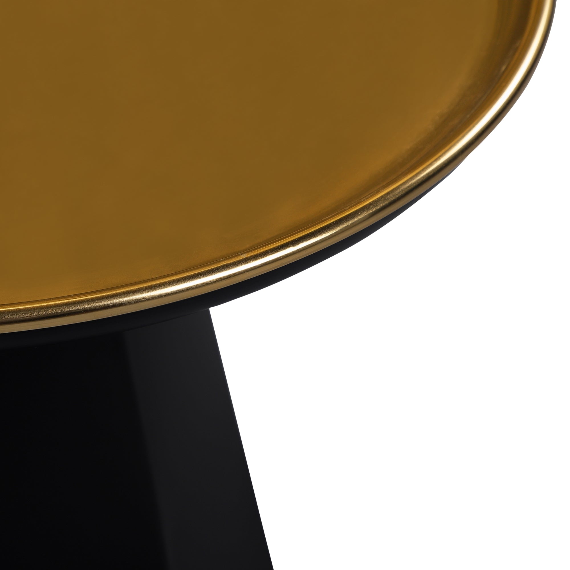 Close-up of a golden plate with a black rim.